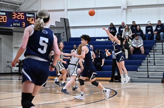 Scranton's Lexi Iveson (2) shoots a three-pointer against Penn State DuBois.  Lexi led the Lady Lions with 12 points.