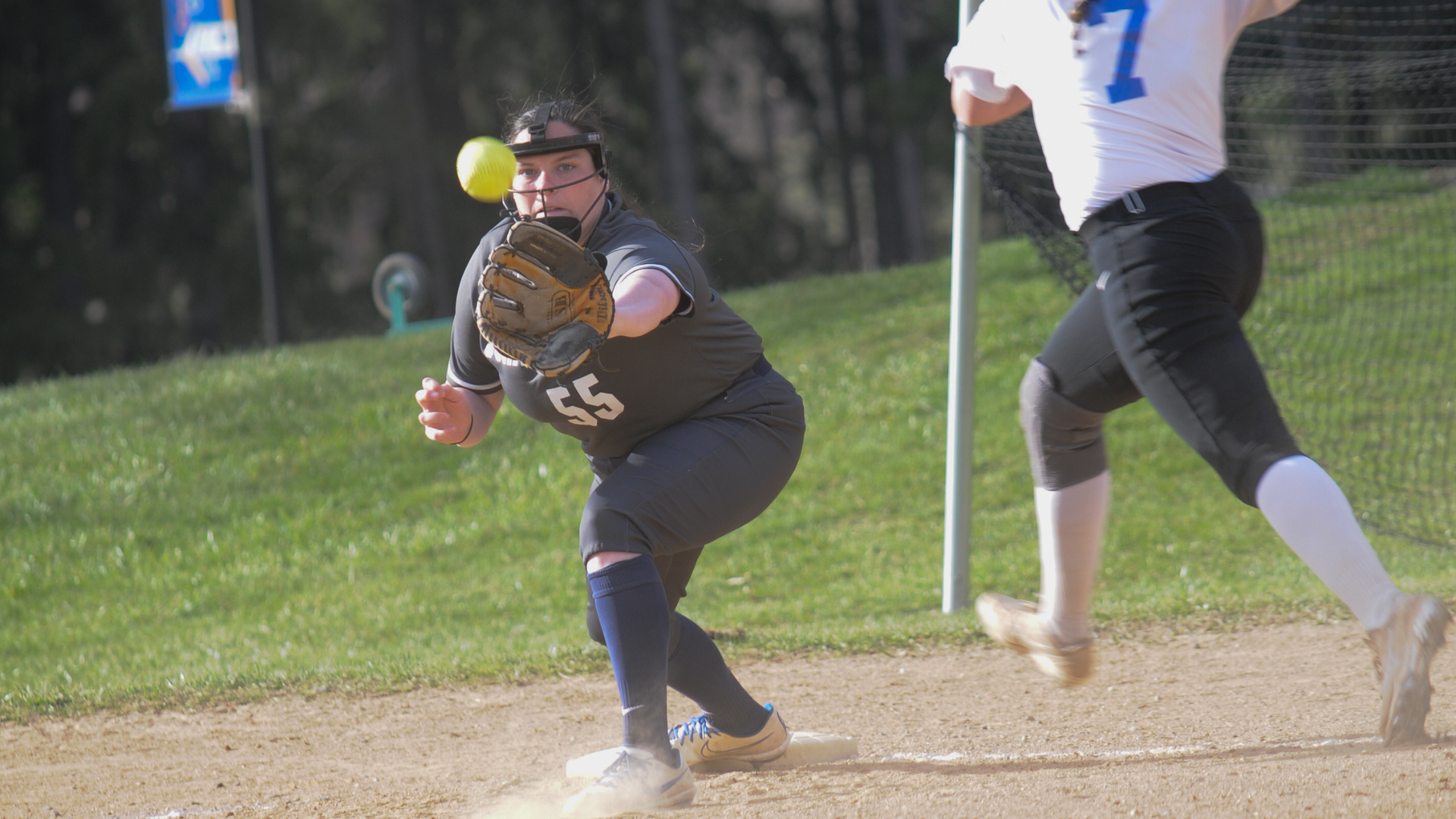 Sarah Fastenau makes a play at 1st base at Clarks Summit University Wednesday afternoon.