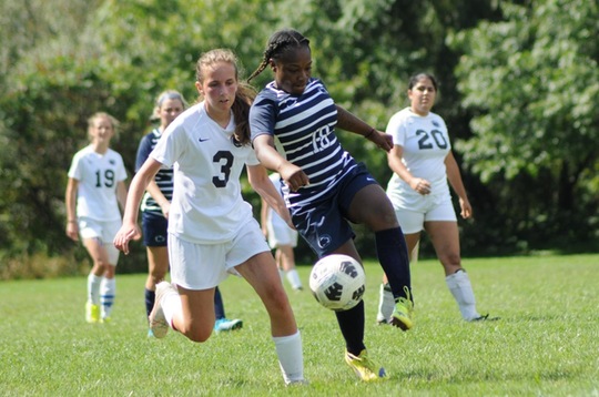 Scranton midfielder Maria Keifer (3) fights for the ball with Penn State Brandywine's Canille Southerland (18).  The Lady Lions fell to Brandywine 0-2 in their home opener Saturrday afternoon.