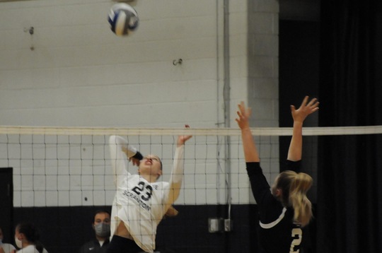 Freshman middle hitter Brianna Smith (23) attempts a kill against Penn State York at home Monday night. Brianna had three kills in the PSUAC match-up.